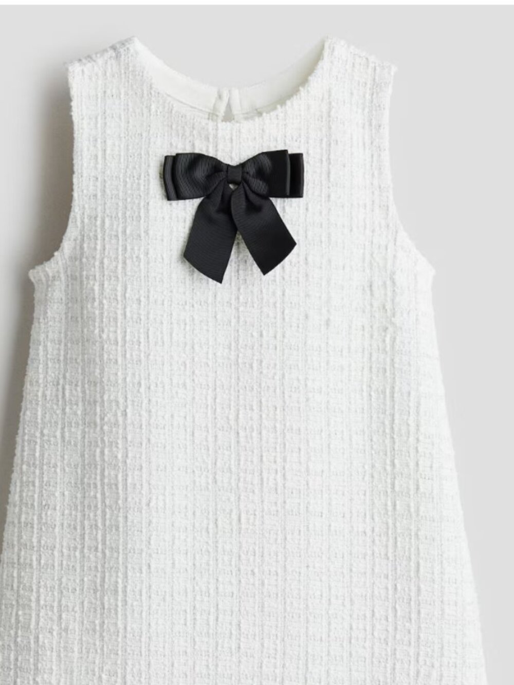 Girls White Bouclé-Jersey A-Line Dress with Black Bow